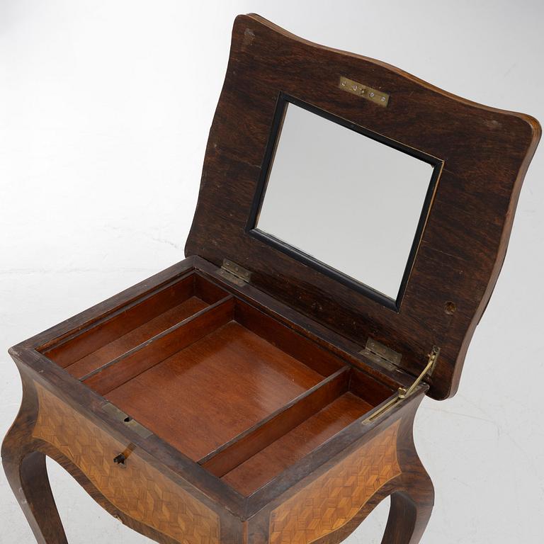 A Louis XV-style sewing table, 19th century.