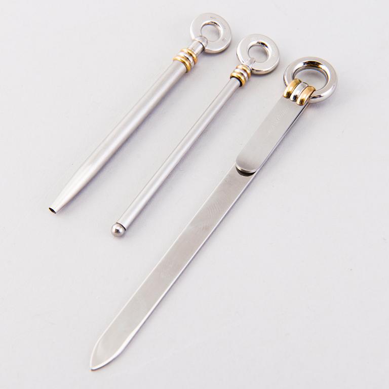 A PEN, CHAMPAGNE BEATER and BOOK MARK, must de Cartier.