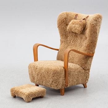 Fåtölj med fotpall, 1900-talets första hälft.