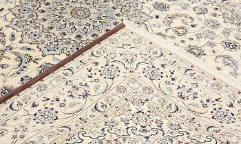 A carpet Nain, part silk, so-called 9LAA, c. 347 x 253 cm.