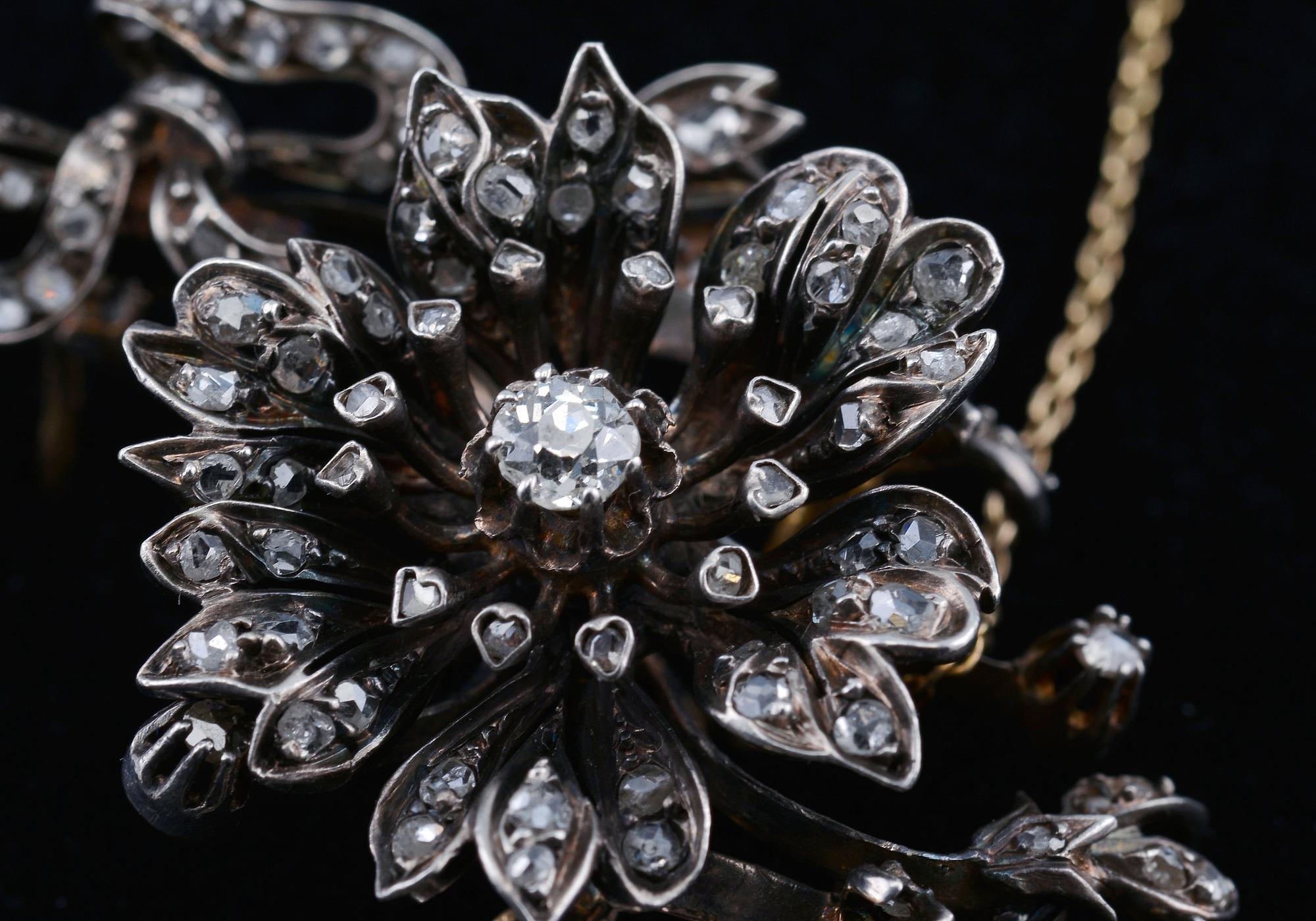 RINTANEULA, keskikivi vanhahiontainen timantti n. 0.35 ct. 118 pieniä ruusuhiottuja timantteja. Hopeaa ja 18K kultaa.