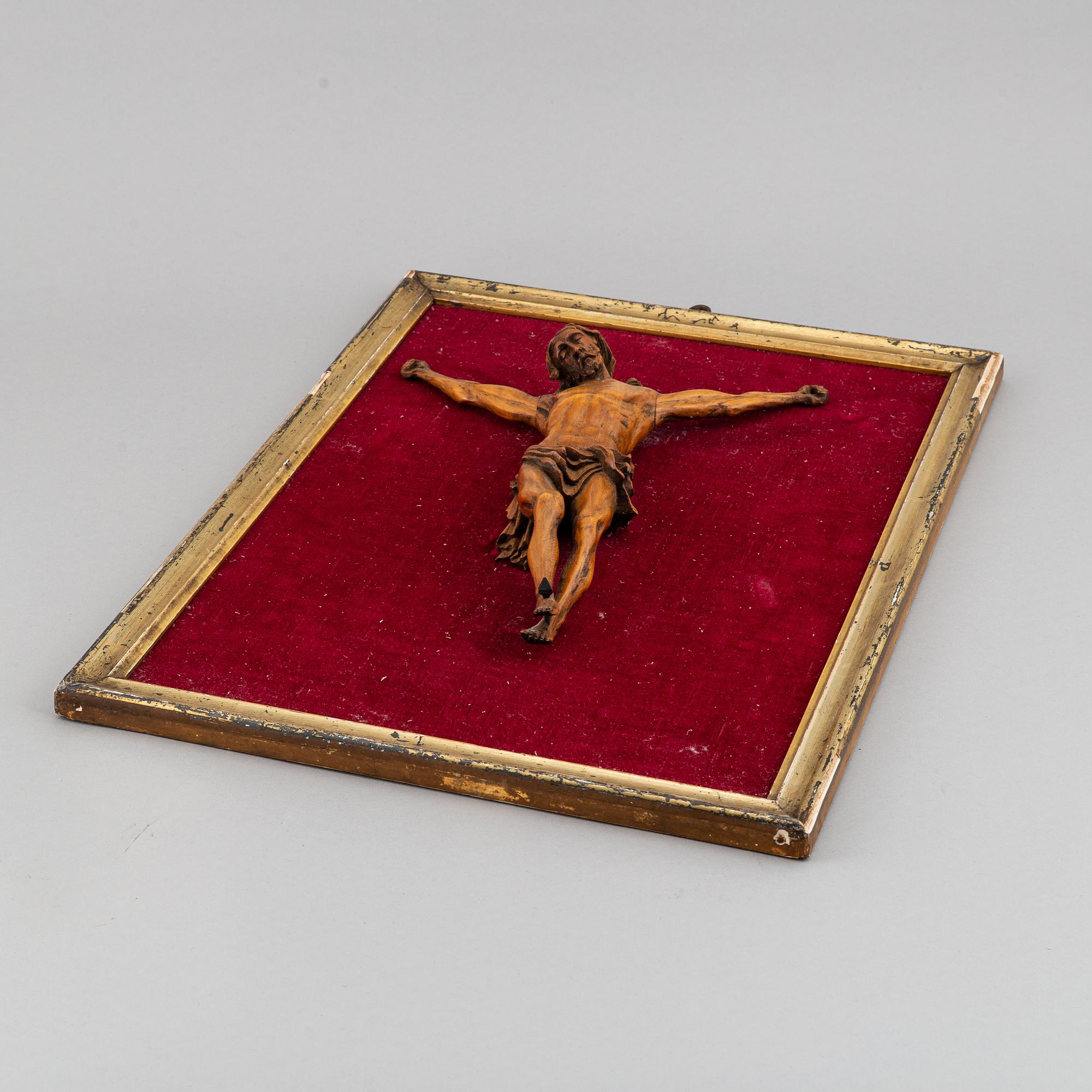 A carved wood crucifix, 17th/18th century.