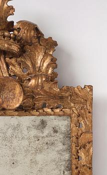 A baroque carved giltwood frame / mirror, circa 1700.