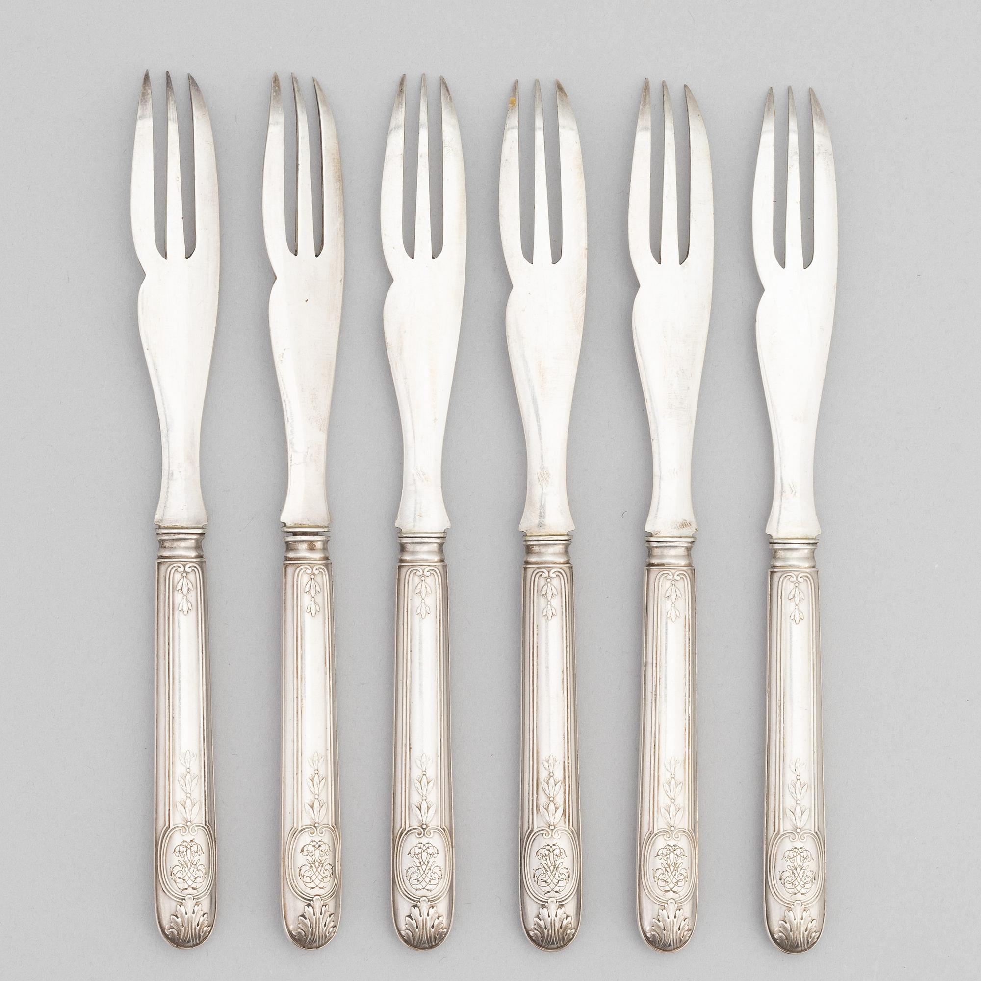 A set of twelve French silver lobster cutlery, 19th century.