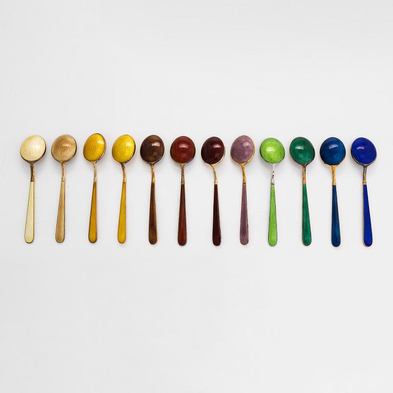 Tillander, a 12-piece set of enamelled and gilt sterling silver coffee spoons, Helsinki 1971-76.