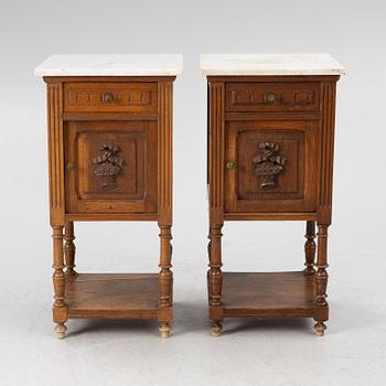 Á pair of bedside tables, circa 1900.