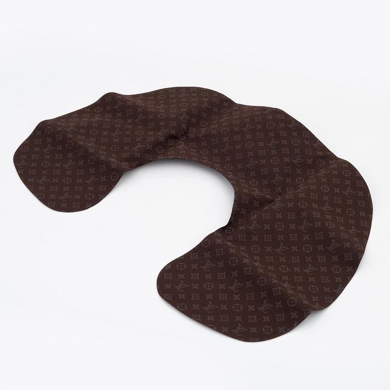 Louis Vuitton, a monogram "Trousse kit de voyage' travel kit with inflatible pillow and eye mask.