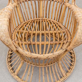 a rattan chair by Gio Ponti & Lio Carminati, Italy, second half of the 20th century.