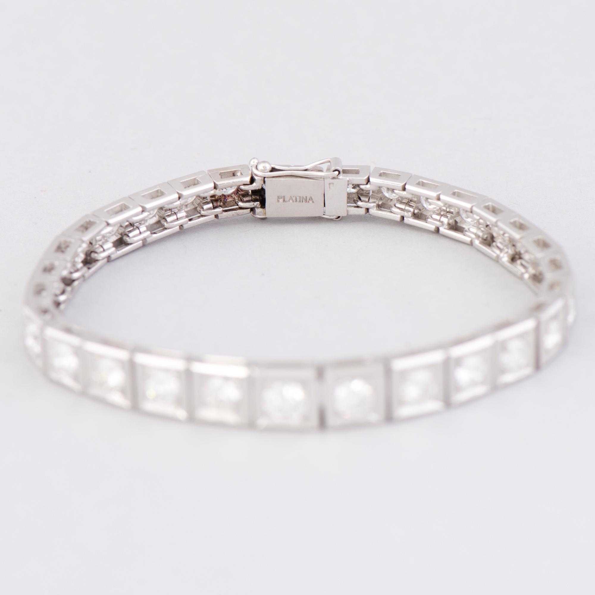 ARMBAND, briljantslipade diamanter, platina.