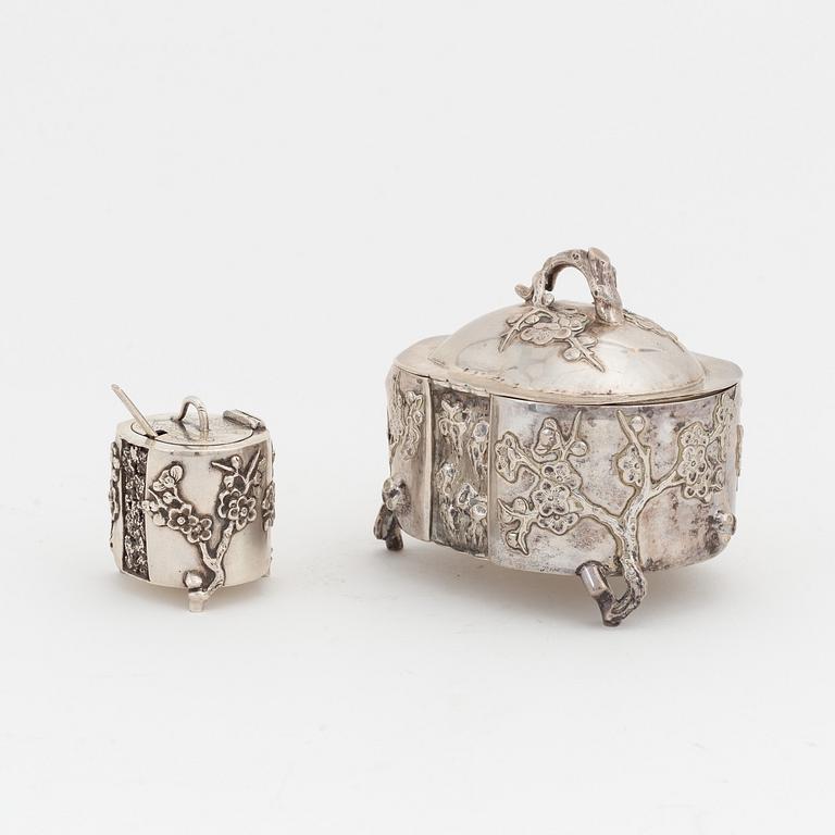 A silver salt cellar and a lided box, first half of the 20th century.