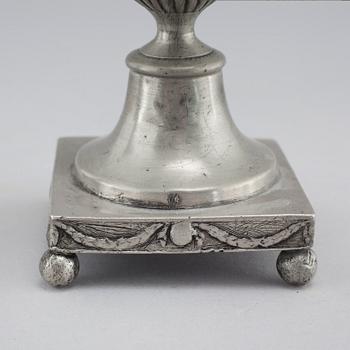 A pair of pewter candlesticks by Adolf Fredrik Moberg in Jönköping, 1824.