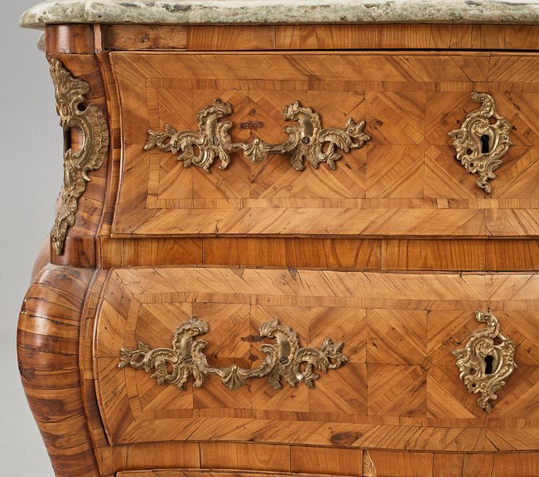 A Swedish early Rococo 18th century commode by Christian Linning (master in Stockholm 1744-1779).