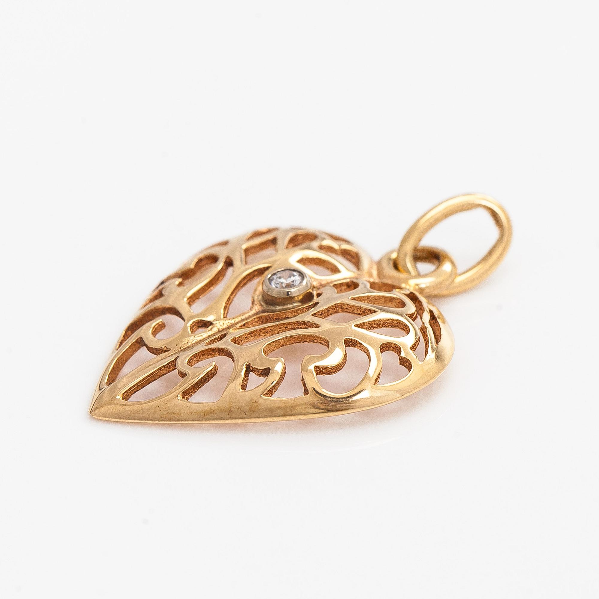 Kalevala Koru, pendant, “Onnen sydän”, 14K gold, small diamond.