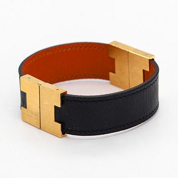 Hermès, a 'Lurie' leather bracelet.