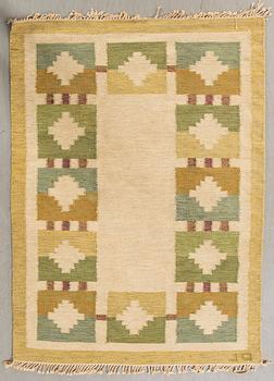 A flat weave signed carpet ca 192x148 cm.