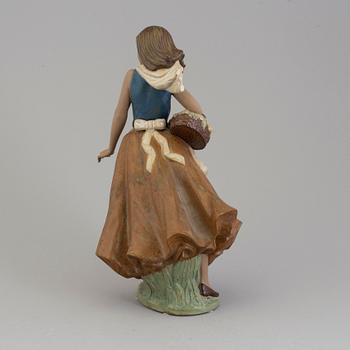 A Spanish NAO ceramic figurine, 1990s.