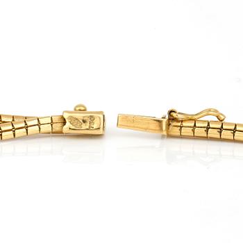 COLLIER, 18k guld, vikt ca 37 gram.
