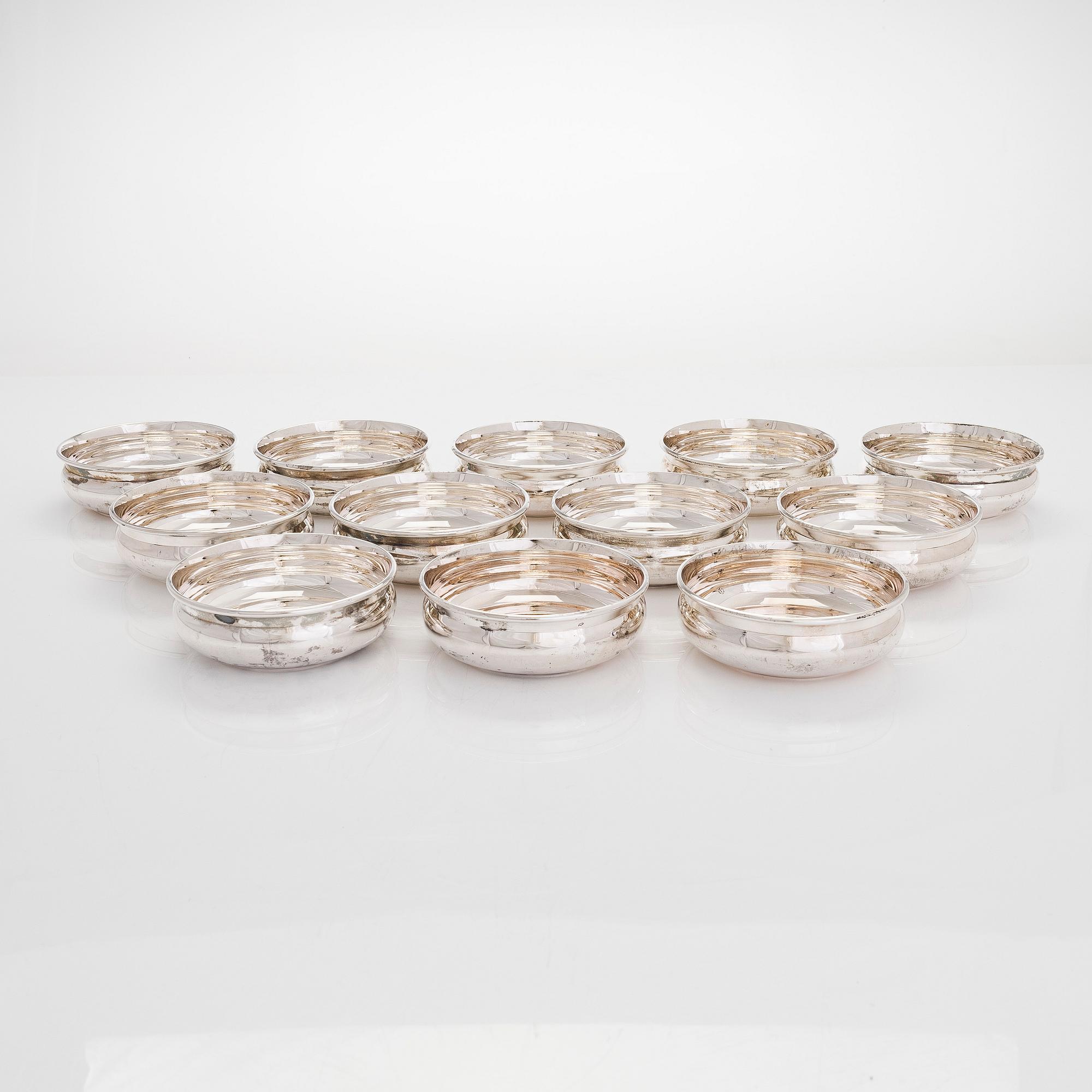 A set of twelve Birk's sterling silver dessert bowls, 20th century.