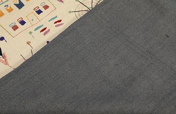 A hand-embroidered Kilim rug, approx. 244 x 180 cm.