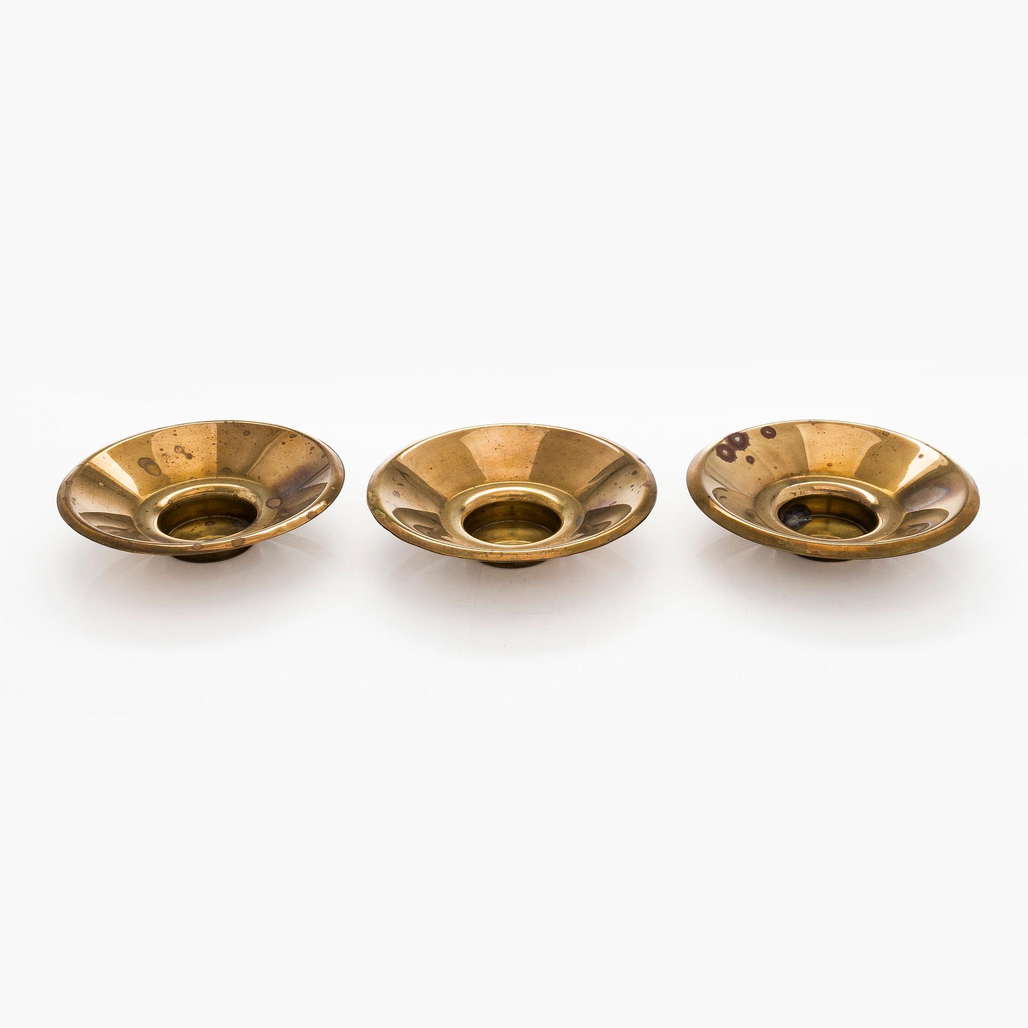 Maija Heikinheimo, a set of three mid-20th century brass underlay for tealight, Valaistustyö for Artek.