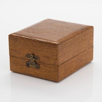 Alexander Fuld, a parcel-gilt beaker, Moscow 1895. In an oak case marked I.E. Morozov St. Petersburg.