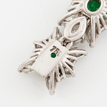 A bracelet in 18K white gold with step-cut emeralds and round and navette-shaped brilliant-cut diamonds.