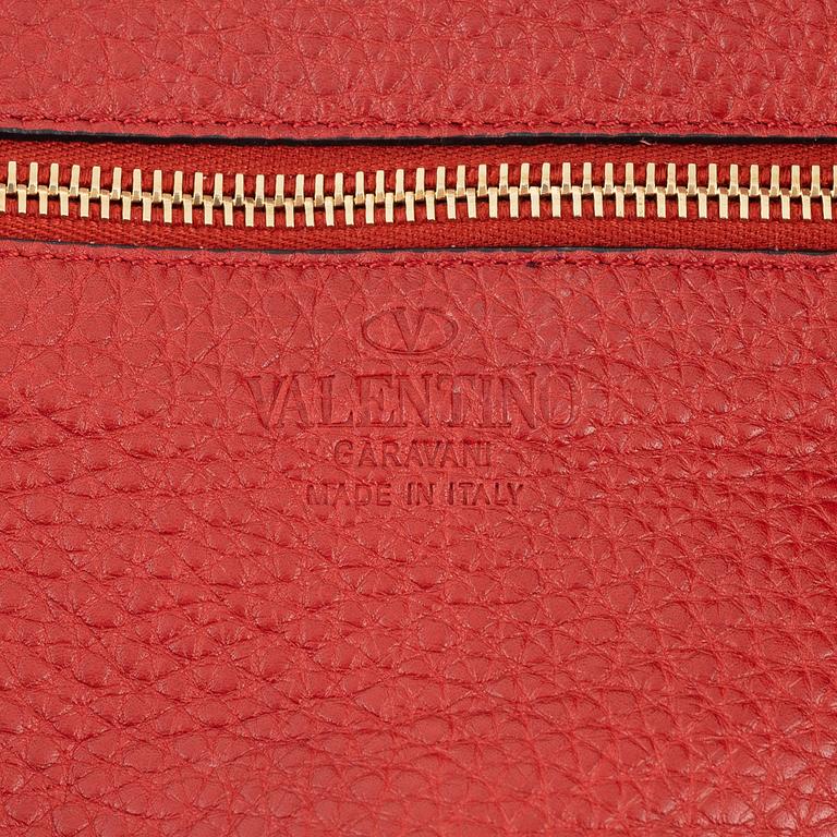 Valentino Gravani, a red leather studded tote bag, 2018.
