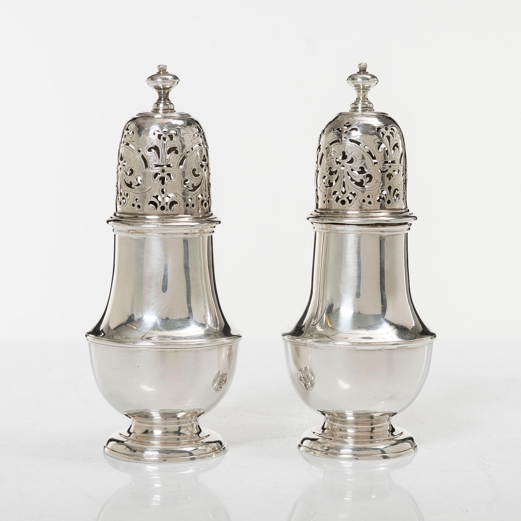 A pair of Britannia standard silver sugar-casters, marks of Samuel Welder, London, 1723.