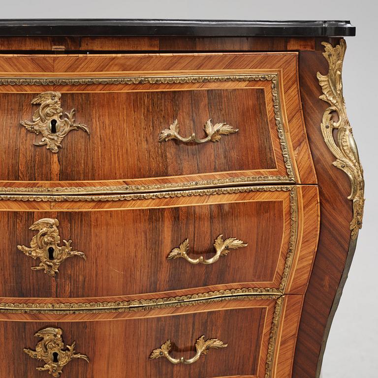 A rococo parquetry and gilt brass-mounted commode possibly by C. Åhman (master in Stockholm 1748-1783).