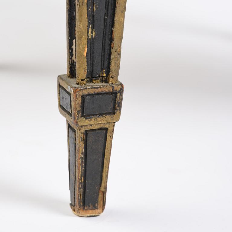 A French Louis XVI chair, late 18th century.