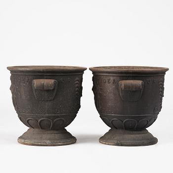 Ivar Johnsson, a pair of "Venus" cast iron urns, Näfveqvarns bruk, Swedish Grace.