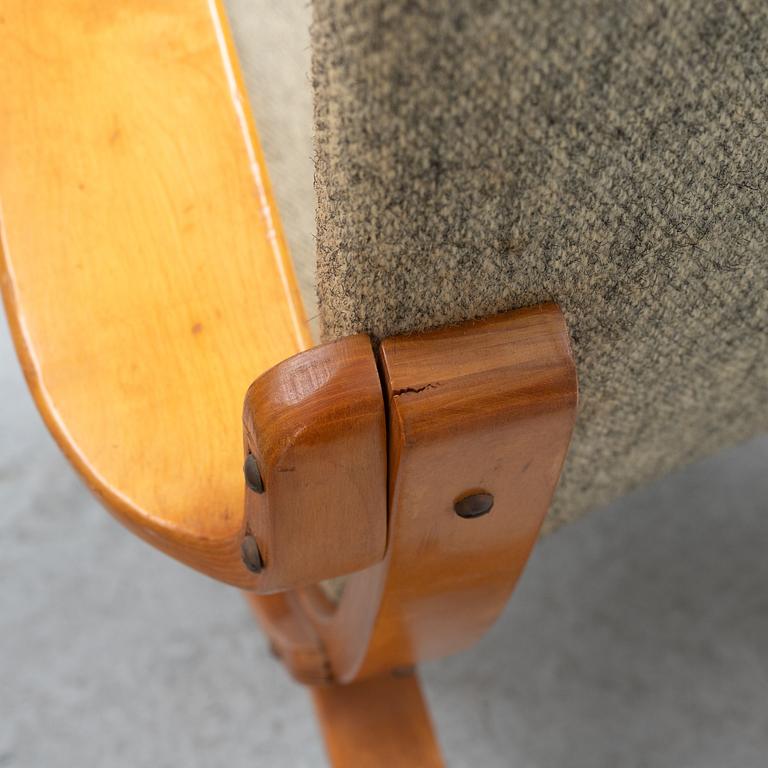 A pair of birch tree easy chairs. Mid 20th century.