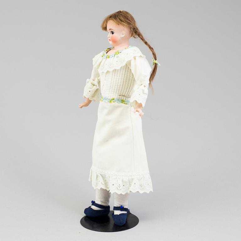 a German porcelain doll from the early 20th century.