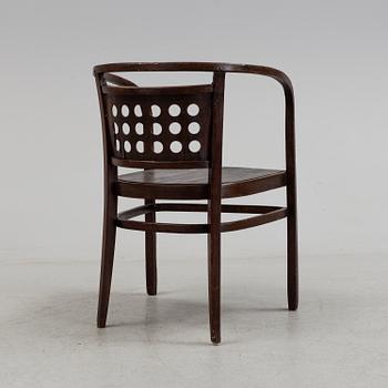 A STAINED BENTWOOD ARMCHAIR BY OTTO WAGNER FOR JACOB & JOSEF KOHN WIEN, EARLY 20TH CENTURY.