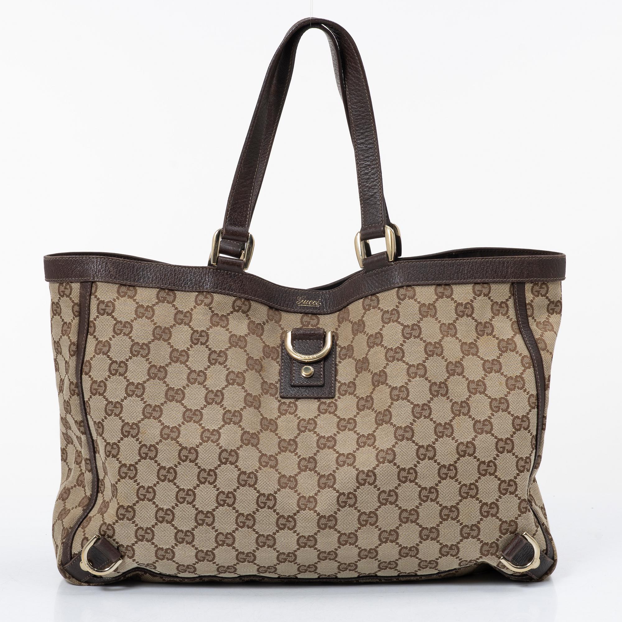 Gucci, a canvas and leather bag.