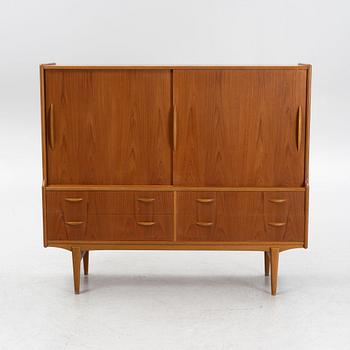 A teak veneered cabinet, 1960s.