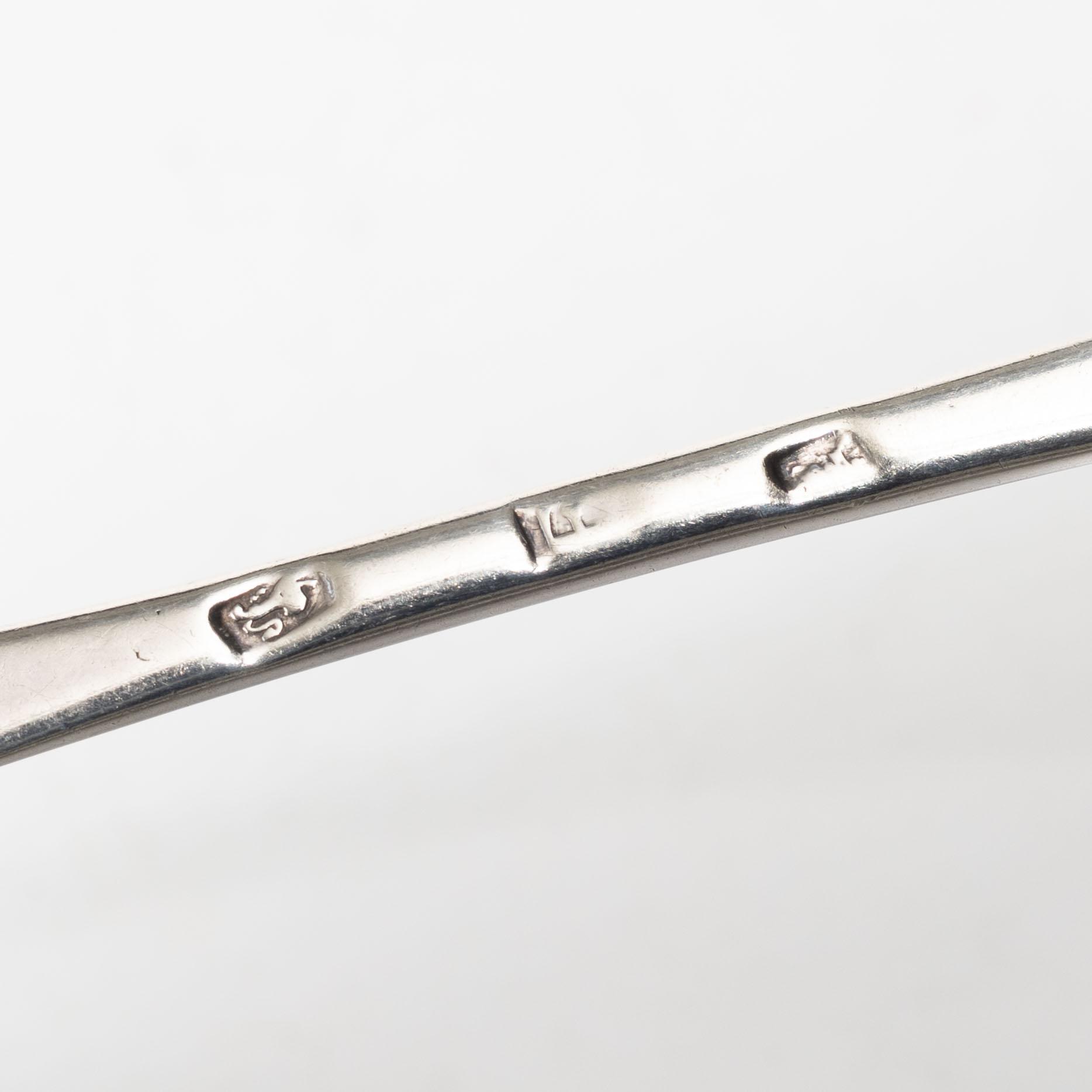 Two silver rat-tail spoons, one with mark of Edward Bennett I, London, circa 1730.