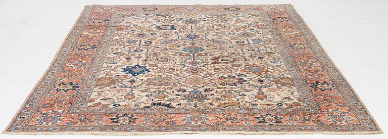 A semi antique Tabriz carpet, c. 290 x 195 cm.
