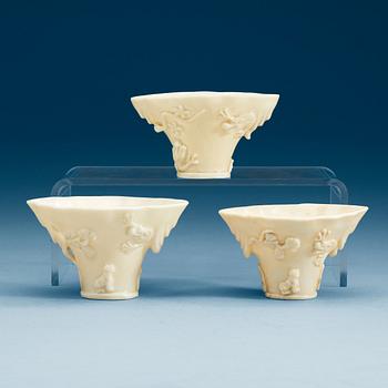 A set of three blanc de chine libation cups, Qing dynasty.