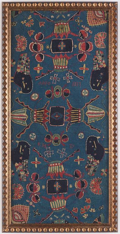 Inramad åkdyna, broderad, ca 93,5 x 43 cm, signerad AMA, Skåne, daterad 1811.