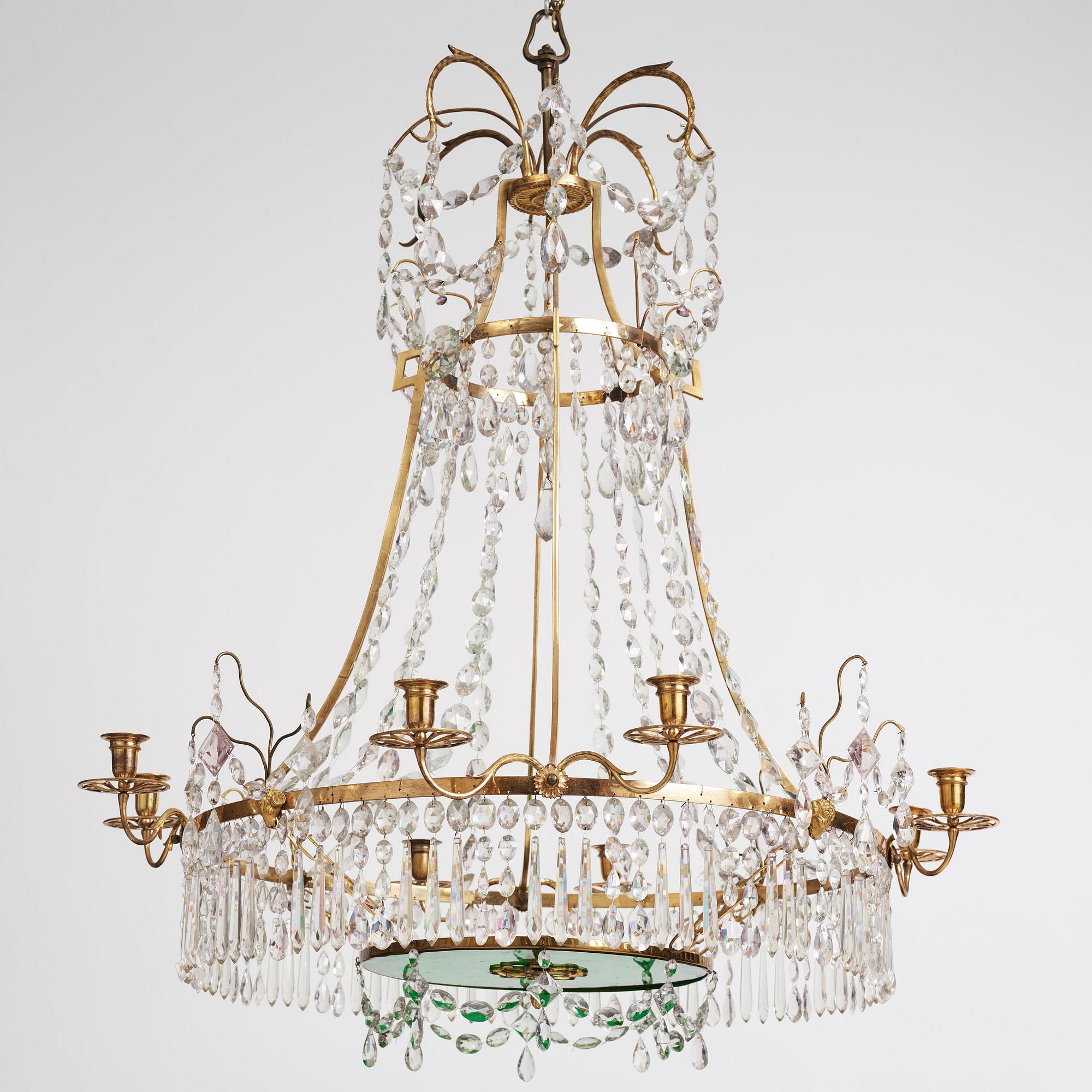 A German Louis XVI ormolu and cut-glass nine-light chandelier attributed to Johann Christoph Ermisch, late 18th century.