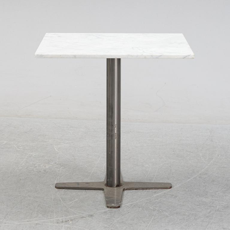 A marble top table, 21th century.