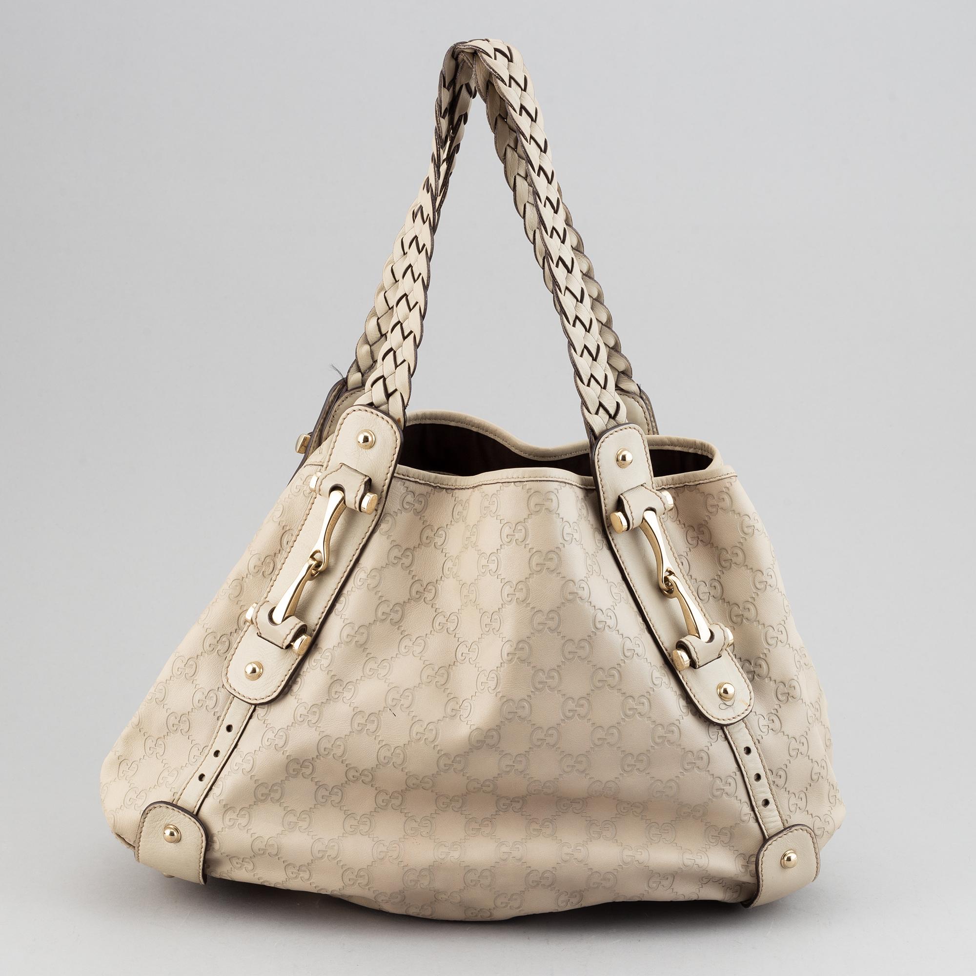 Gucci, leather bag.