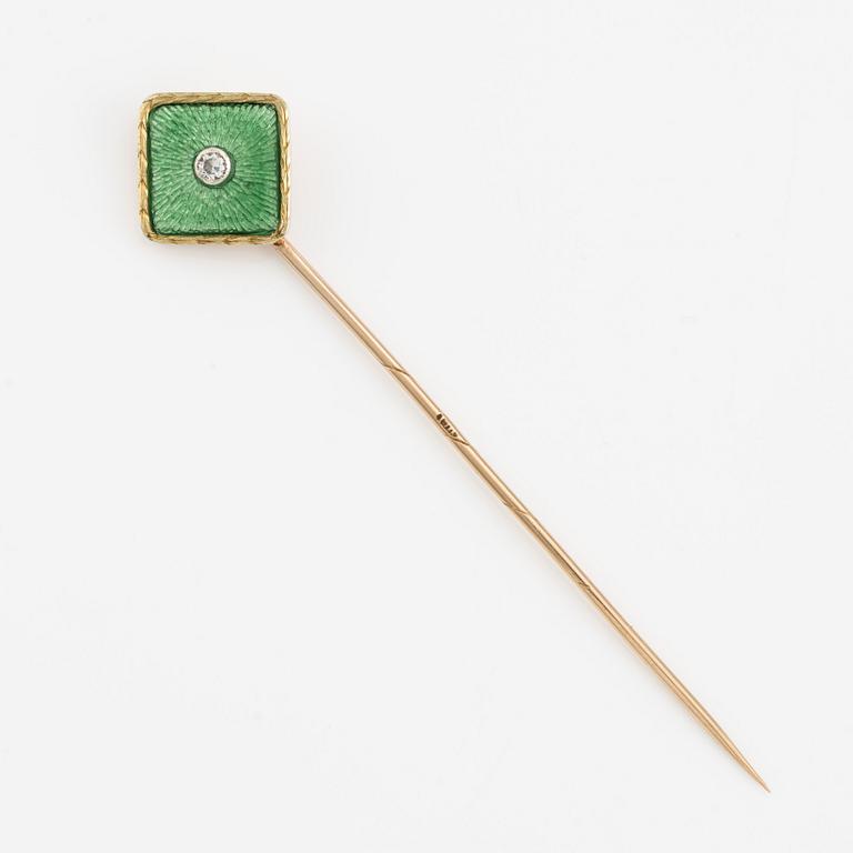 A tie pin 14K gold and guilloché enamel with a diamond.