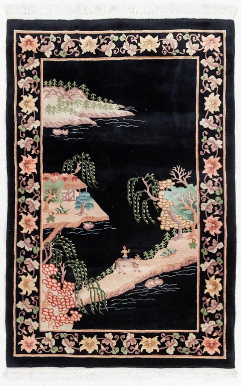 A Chinese rug, c. 183 x 120 cm.