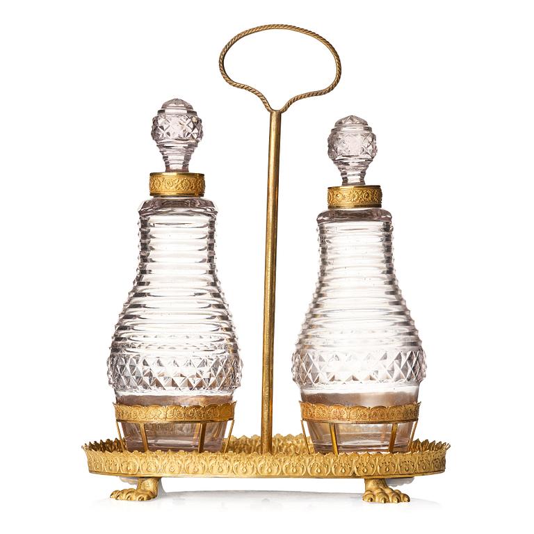 A Empire gilded brass and glass, cruet-set.