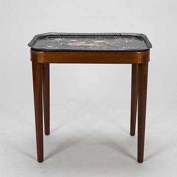 A tray table, late 19th century and first half of the 20th century.