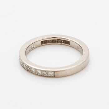 Brilliant-cut diamond half eternity ring.