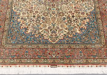 A rug, Figural Oriental silk,  signed, ca 175 x 125 cm.