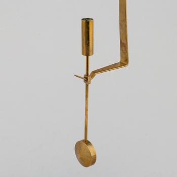 PIERRE FORSSELL, A pair of brass wallscones from Skultuna.